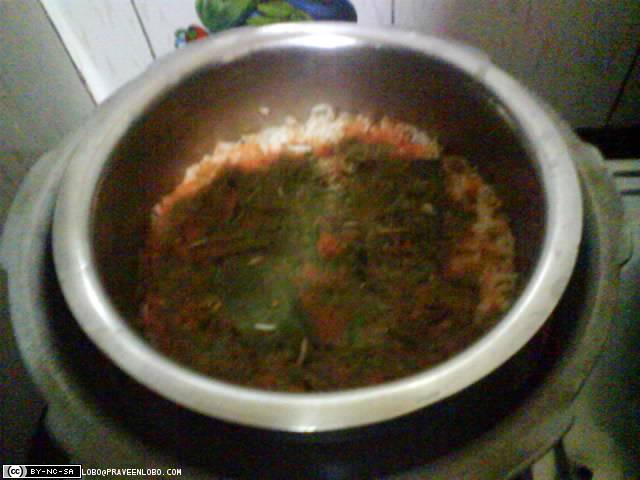 Boil rice(not completely) with tomato juice, coriander, mint etc.